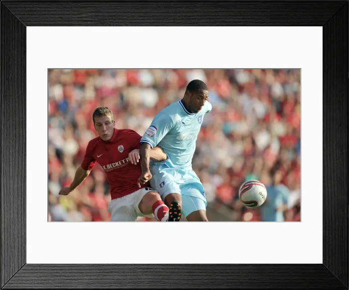 Framed Print : Clive Platt Outmuscles Jim McNulty: Coventry City's Victory Moment at Barnsley's Oakwell Stadium (Npower Football League Championship, October 2011) Framed Print : Clive Platt Outmuscles Jim McNulty: Coventry City's Victory Moment at Barnsley's Oakwell Stadium (Npower Football League Championship, October 2011)
