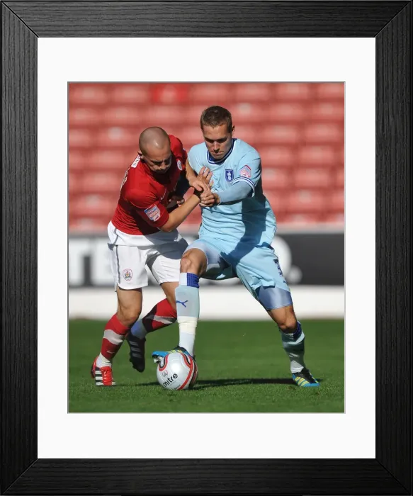 Framed Print : Barnsley vs Coventry City: Intense Battle for Control in Championship Match Framed Print : Barnsley vs Coventry City: Intense Battle for Control in Championship Match