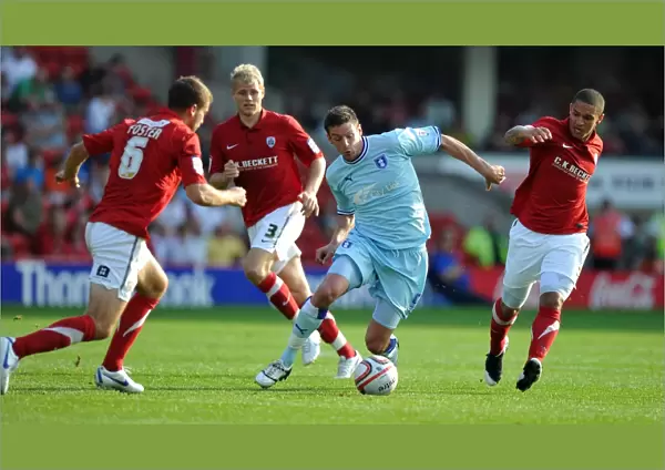 Coventry City vs Barnsley: Lucas Jutkiewicz Faces Off Against Stephen Foster and Nathan Doyle at Oakwell Stadium, Npower Football League Championship (1st October 2011)
