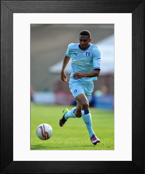 Framed Print : Coventry City vs Barnsley, Npower Championship: Cyrus Christie at Oakwell Stadium (1-10-2011)