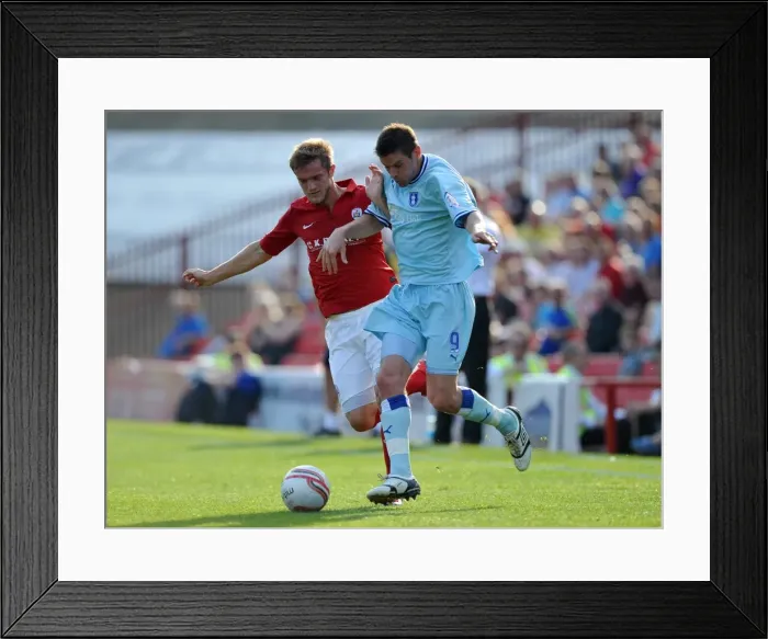 Framed Print : Barnsley vs Coventry City: Intense Battle for the Ball between Scott Wiseman and Lucas Jutkiewicz (Npower Football League Championship, Oakwell Stadium, 01-10-2011) Framed Print : Barnsley vs Coventry City: Intense Battle for the Ball between Scott Wiseman and Lucas Jutkiewicz (Npower Football League Championship, Oakwell Stadium, 01-10-2011)