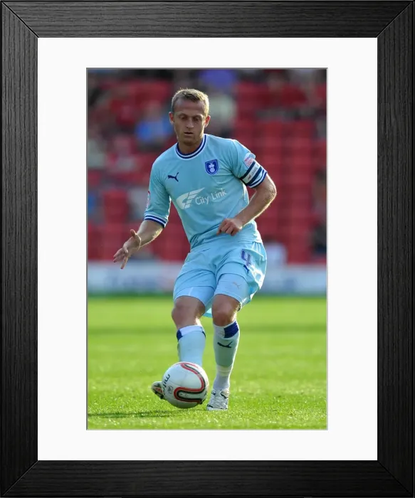 Framed Print : Sammy Clingan of Coventry City in Action at Oakwell Stadium against Barnsley in the Npower Football League Championship (1st October 2011) Framed Print : Sammy Clingan of Coventry City in Action at Oakwell Stadium against Barnsley in the Npower Football League Championship (1st October 2011)