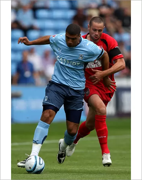 Coventry City vs Ipswich Town: A Battle for Supremacy in the Championship - Leon Best vs Damien Delaney at Ricoh Arena (09-08-2009)