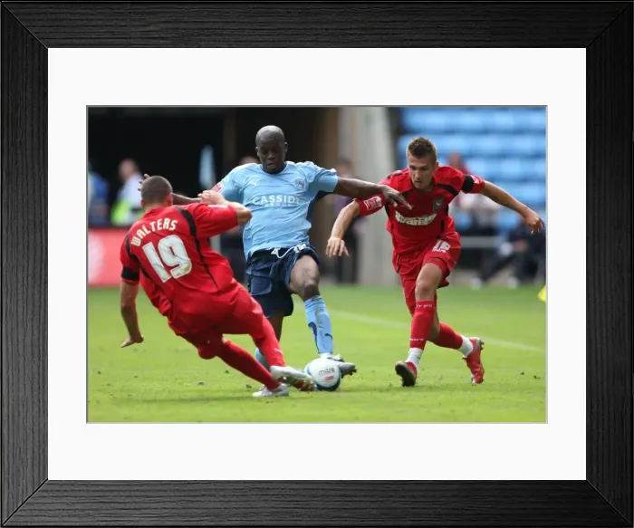 Framed Print : Coventry City vs Ipswich Town: Intense Battle for the Ball in the Championship