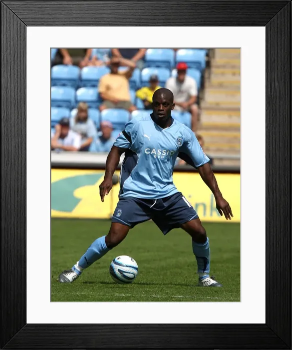 Framed Print : Isaac Osbourne in Action: Coventry City vs Ipswich Town (Championship Clash at Ricoh Arena, 09-08-2009) Framed Print : Isaac Osbourne in Action: Coventry City vs Ipswich Town (Championship Clash at Ricoh Arena, 09-08-2009)