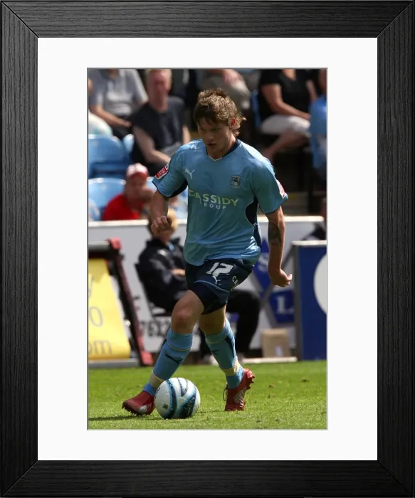 Framed Print : Aron Gunnarsson's Epic Showdown: Coventry City vs Ipswich Town at Ricoh Arena (September 8, 2009) Framed Print : Aron Gunnarsson's Epic Showdown: Coventry City vs Ipswich Town at Ricoh Arena (September 8, 2009)