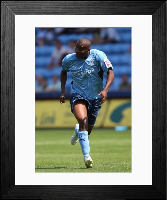 Framed Print : Clinton Morrison Leads Coventry City Charge Against Ipswich Town in Championship Showdown at Ricoh Arena (09-08-2009) Framed Print : Clinton Morrison Leads Coventry City Charge Against Ipswich Town in Championship Showdown at Ricoh Arena (09-08-2009)