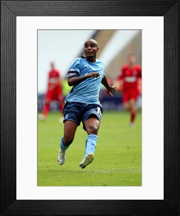Framed Print : Clinton Morrison Sparks Coventry City's Championship Battle Against Ipswich Town at Ricoh Arena (09-08-2009)