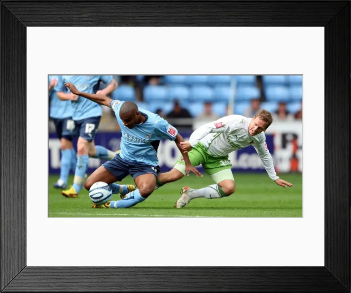 Framed Print : Clinton Morrison vs. Brian Howard Clash in Coventry City vs. Reading Championship Match Framed Print : Clinton Morrison vs. Brian Howard Clash in Coventry City vs. Reading Championship Match
