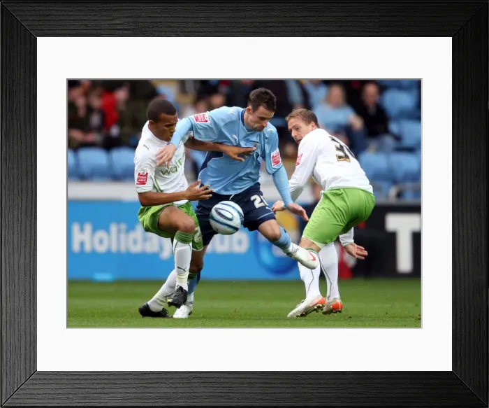 Framed Print : Coventry City vs Reading: Intense Battle for the Ball - McIndoe vs Bertrand and Howard (Championship 2009) Framed Print : Coventry City vs Reading: Intense Battle for the Ball - McIndoe vs Bertrand and Howard (Championship 2009)