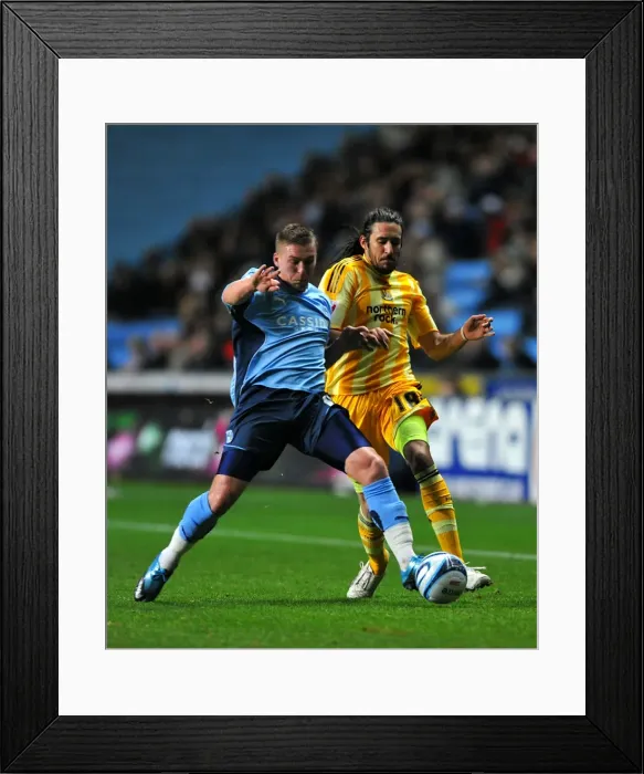 Framed Print : Battle for Supremacy: Coventry City vs. Newcastle United in the Championship - Freddy Eastwood vs. Jonas Gutierrez at Ricoh Arena (09-12-2009) Framed Print : Battle for Supremacy: Coventry City vs. Newcastle United in the Championship - Freddy Eastwood vs. Jonas Gutierrez at Ricoh Arena (09-12-2009)