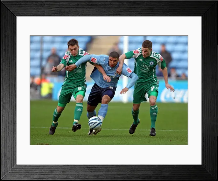 Framed Print : Challenge at Ricoh Arena: Coventry City vs. Peterborough United in Coca-Cola Championship - Leon Best vs. Lee Frecklington and Paul Coutts Framed Print : Challenge at Ricoh Arena: Coventry City vs. Peterborough United in Coca-Cola Championship - Leon Best vs. Lee Frecklington and Paul Coutts