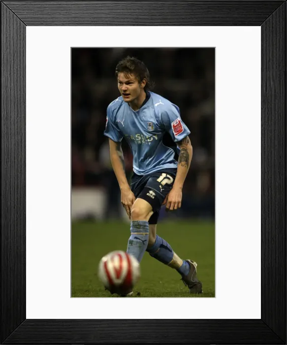 Framed Print : Gunnarsson in Action: Coventry City vs. Nottingham Forest, Championship 2009 Framed Print : Gunnarsson in Action: Coventry City vs. Nottingham Forest, Championship 2009