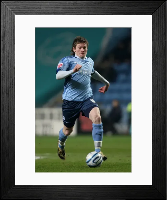 Framed Print : Championship Showdown: Aron Gunnarsson's Battle at Ricoh Arena (Coventry City vs Nottingham Forest, 09-02-2010) Framed Print : Championship Showdown: Aron Gunnarsson's Battle at Ricoh Arena (Coventry City vs Nottingham Forest, 09-02-2010)