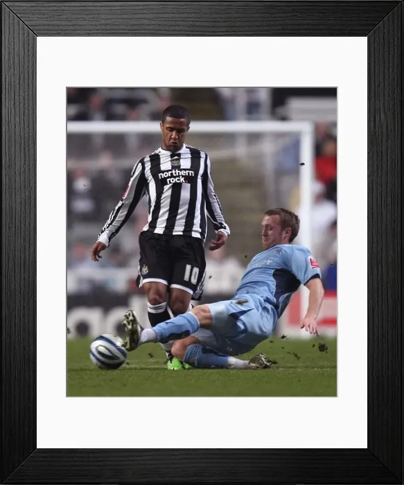 Framed Print : Clash at St. James Park: Coventry City vs. Newcastle United - Sammy Clingan Tackles Wayne Routledge in Championship Showdown (17-02-2010) Framed Print : Clash at St. James Park: Coventry City vs. Newcastle United - Sammy Clingan Tackles Wayne Routledge in Championship Showdown (17-02-2010)