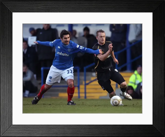 Framed Print : Clash at Fratton Park: Sammy Clingan vs. Richard Hughes in FA Cup Third Round Showdown Framed Print : Clash at Fratton Park: Sammy Clingan vs. Richard Hughes in FA Cup Third Round Showdown