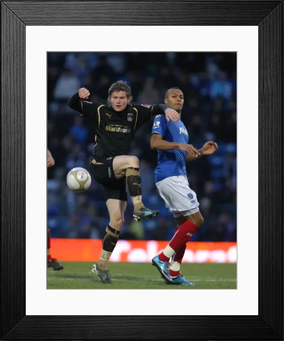 Framed Print : Battling for the FA Cup: Kaboul vs. Gunnarsson at Fratton Park (Portsmouth v Coventry City, 2010) Framed Print : Battling for the FA Cup: Kaboul vs. Gunnarsson at Fratton Park (Portsmouth v Coventry City, 2010)