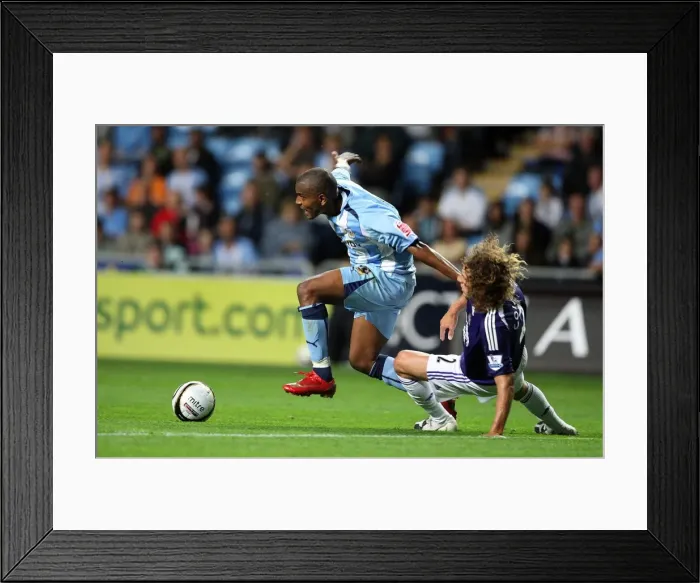 Framed Print : Clinton Morrison vs Fabricio Coloccini: Coventry City vs Newcastle United in Carling Cup Second Round Framed Print : Clinton Morrison vs Fabricio Coloccini: Coventry City vs Newcastle United in Carling Cup Second Round