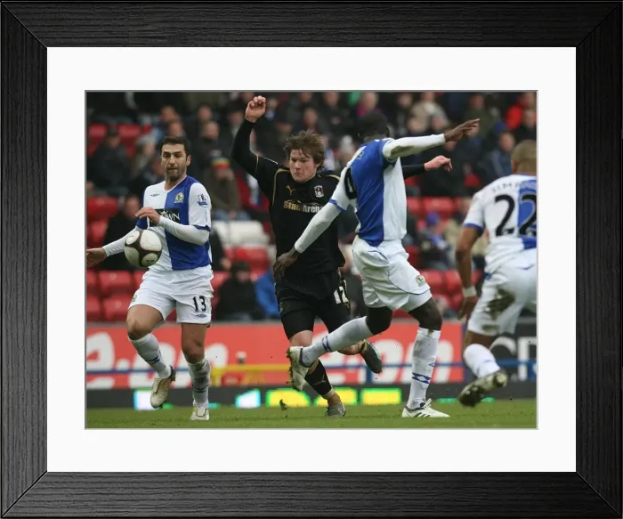 Framed Print : Coventry City vs. Blackburn Rovers: Aron Gunnarsson's Determined Struggle Against Christopher Samba in the FA Cup Fifth Round at Ewood Park Framed Print : Coventry City vs. Blackburn Rovers: Aron Gunnarsson's Determined Struggle Against Christopher Samba in the FA Cup Fifth Round at Ewood Park