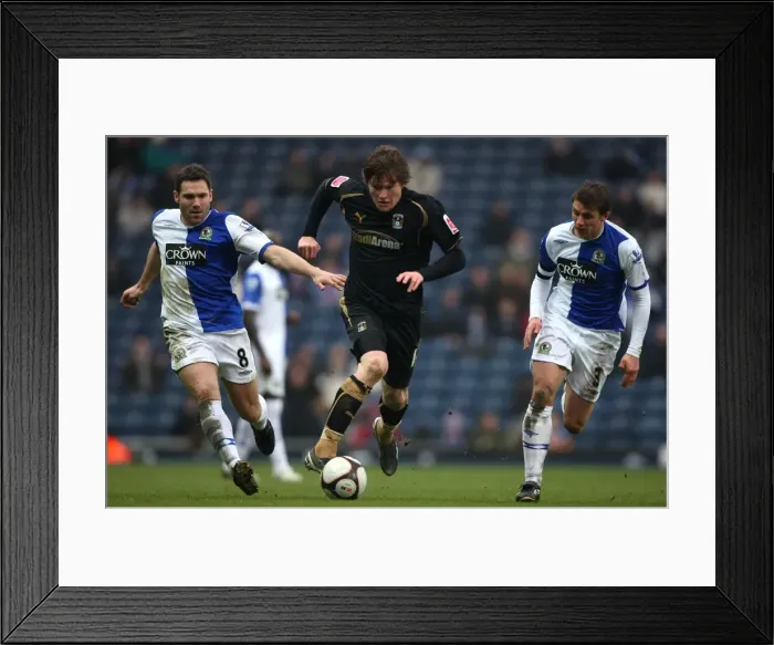 Framed Print : Fifth Round FA Cup Clash: Aron Gunnarsson of Coventry City vs. Blackburn Rovers David Dunn and Stephen Warnock (2009) Framed Print : Fifth Round FA Cup Clash: Aron Gunnarsson of Coventry City vs. Blackburn Rovers David Dunn and Stephen Warnock (2009)