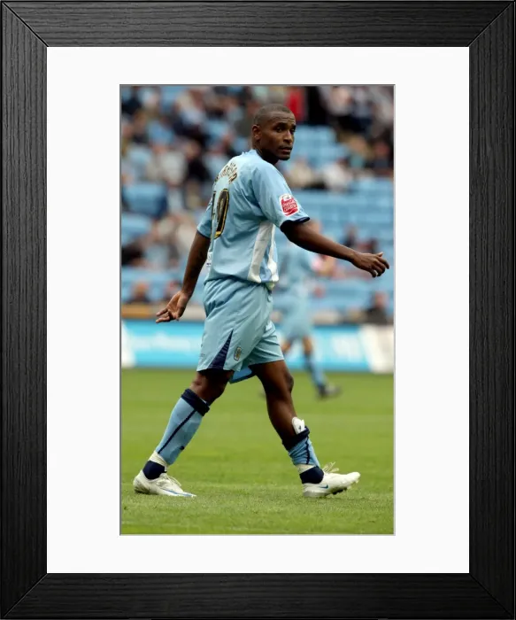 Framed Print : Clinton Morrison Leads Coventry City Against Norwich City in Coca-Cola Championship Clash at Ricoh Arena (09-08-2008)