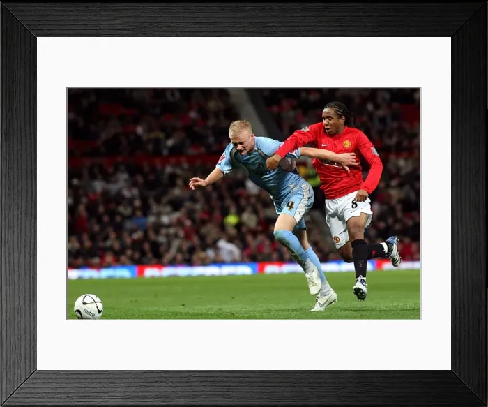 Framed Print : Robbie Simpson vs. Oliveira Anderson: Intense Battle for the Ball in Coventry City's Carling Cup Match against Manchester United (September 2007) Framed Print : Robbie Simpson vs. Oliveira Anderson: Intense Battle for the Ball in Coventry City's Carling Cup Match against Manchester United (September 2007)