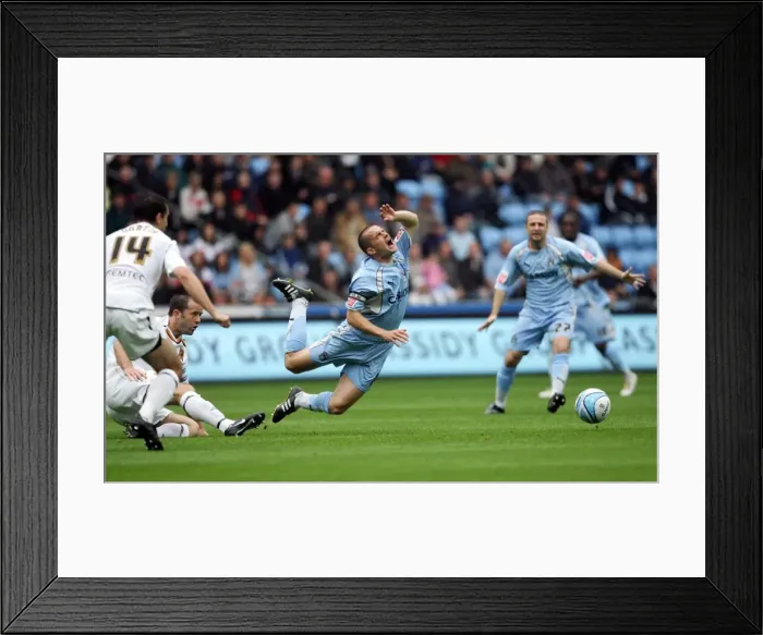 Framed Print : Coventry City vs. Hull City: Championship Clash – Michael Doyle Tripped by Damien Delaney (2007) Framed Print : Coventry City vs. Hull City: Championship Clash – Michael Doyle Tripped by Damien Delaney (2007)