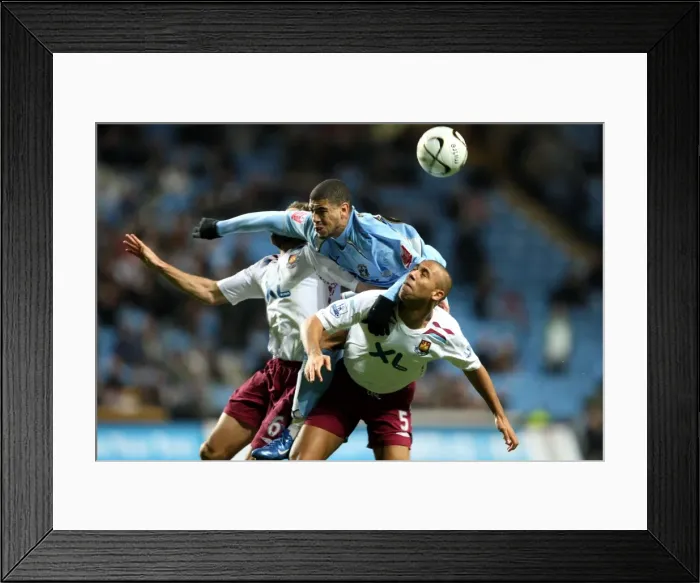 Framed Print : Leon Best's Aerial Dominance: Coventry City vs West Ham United in Carling Cup Fourth Round Framed Print : Leon Best's Aerial Dominance: Coventry City vs West Ham United in Carling Cup Fourth Round