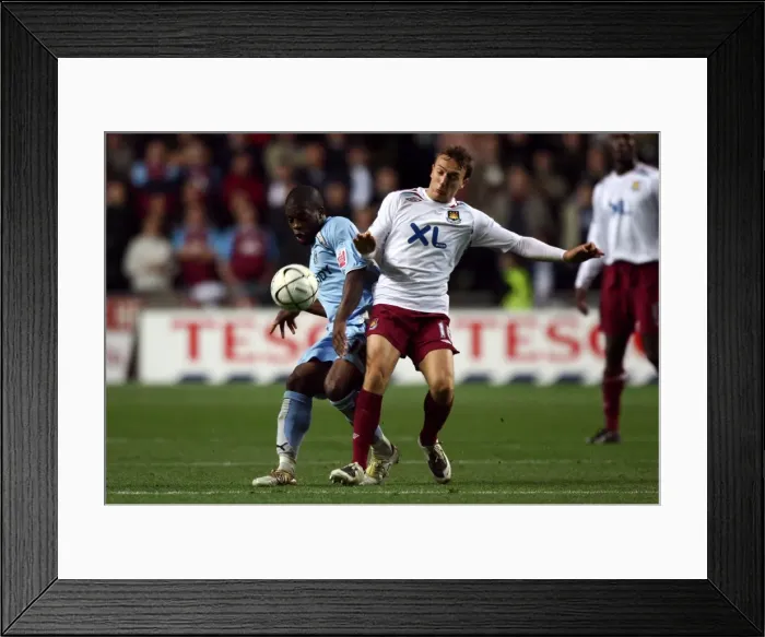 Framed Print : Battle for the Ball: Coventry City vs. West Ham United in Carling Cup Fourth Round Framed Print : Battle for the Ball: Coventry City vs. West Ham United in Carling Cup Fourth Round