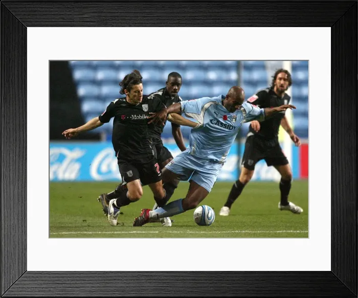 Framed Print : Coventry City vs. West Bromwich Albion: Clash in the Championship - Dele Adebola vs. Robert Koren (Ricoh Arena, 12-11-2007) Framed Print : Coventry City vs. West Bromwich Albion: Clash in the Championship - Dele Adebola vs. Robert Koren (Ricoh Arena, 12-11-2007)