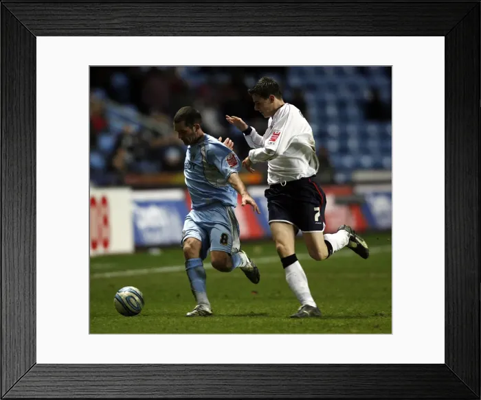 Framed Print : Coventry City vs Ipswich Town: Championship Clash at The Ricoh Arena - Michael Doyle vs Owen Garvan Framed Print : Coventry City vs Ipswich Town: Championship Clash at The Ricoh Arena - Michael Doyle vs Owen Garvan