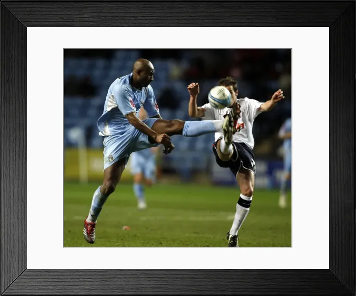 Framed Print : Coventry City vs Ipswich Town: Dele Adebola Battles for the Ball in Coca-Cola Championship Match at The Ricoh Arena (2007) Framed Print : Coventry City vs Ipswich Town: Dele Adebola Battles for the Ball in Coca-Cola Championship Match at The Ricoh Arena (2007)