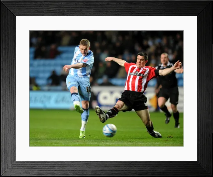 Framed Print : Coventry City vs Sheffield United: Freddy Eastwood's Thrilling Shot in Championship Action at Ricoh Arena (04-03-2009) Framed Print : Coventry City vs Sheffield United: Freddy Eastwood's Thrilling Shot in Championship Action at Ricoh Arena (04-03-2009)