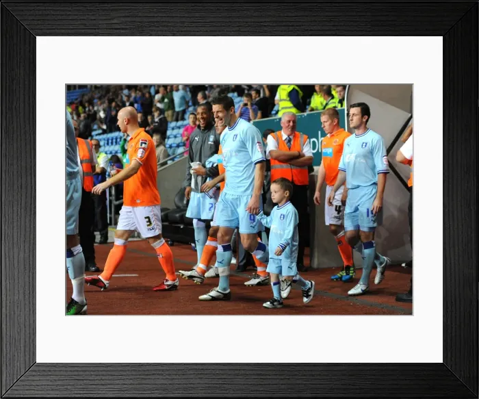 Framed Print : Lukas Jutkiewicz and Mascot Leading Coventry City Out at Ricoh Arena vs Blackpool (Npower Football League Championship, 27-09-2011)