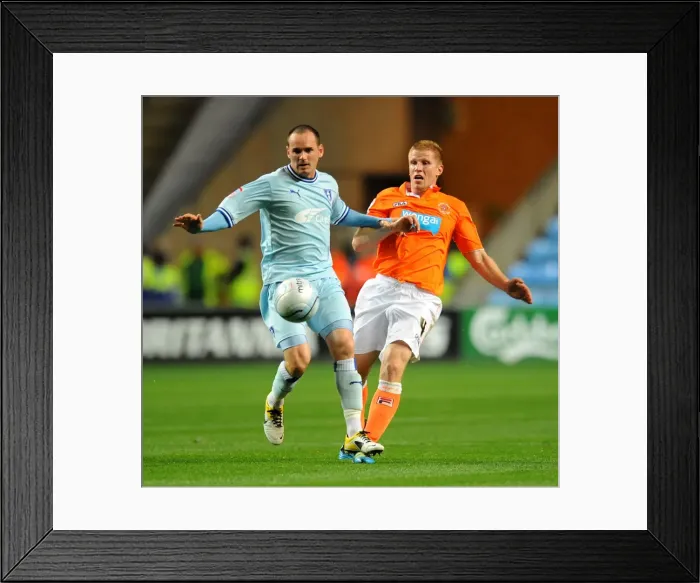 Framed Print : David Bell vs Keith Southern: Intense Battle for Control in Coventry City vs Blackpool Championship Clash (September 27, 2011, Ricoh Arena) Framed Print : David Bell vs Keith Southern: Intense Battle for Control in Coventry City vs Blackpool Championship Clash (September 27, 2011, Ricoh Arena)