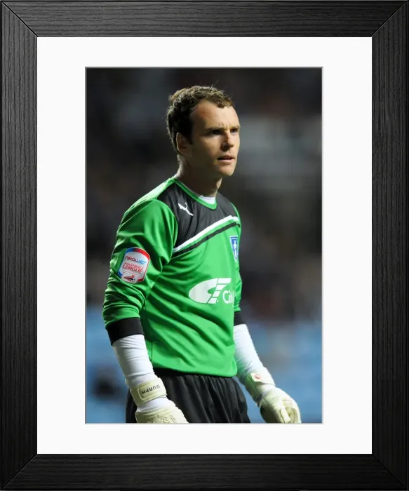 Framed Print : Coventry City vs Blackpool: Joe Murphy in Action at the Ricoh Arena - Npower Championship 2011