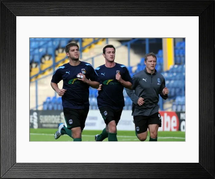 Framed Print : Coventry City Football Club: Pre-Match Warm-Up at Gigg Lane Ahead of Carling Cup Clash with Bury (August 09, 2011)