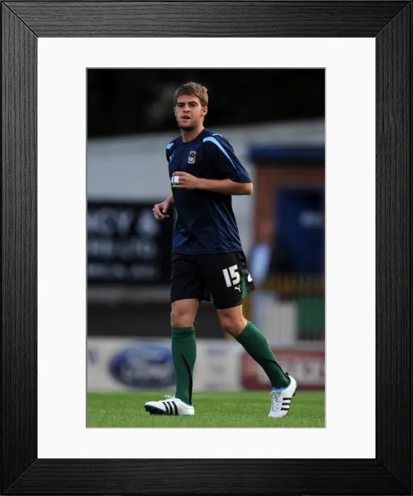Framed Print : Carling Cup First Round Showdown: Coventry City FC vs Bury at Gigg Lane - Martin Cranie's Determined Performance Framed Print : Carling Cup First Round Showdown: Coventry City FC vs Bury at Gigg Lane - Martin Cranie's Determined Performance
