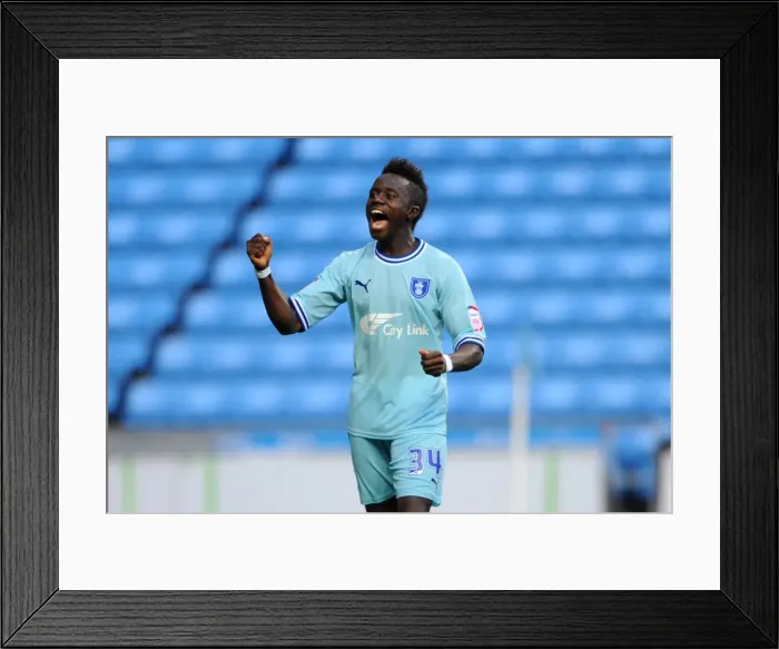 Framed Print : Coventry City FC's Championship Triumph: Gael Bigirimana's Euphoric Moment at Derby County (10-09-2011) Framed Print : Coventry City FC's Championship Triumph: Gael Bigirimana's Euphoric Moment at Derby County (10-09-2011)