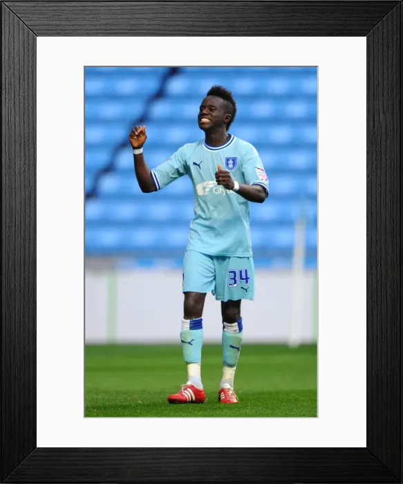 Framed Print : Gael Bigirimana's Triumph: Coventry City FC Secures Championship Victory over Derby County (10-09-2011, Ricoh Arena) Framed Print : Gael Bigirimana's Triumph: Coventry City FC Secures Championship Victory over Derby County (10-09-2011, Ricoh Arena)