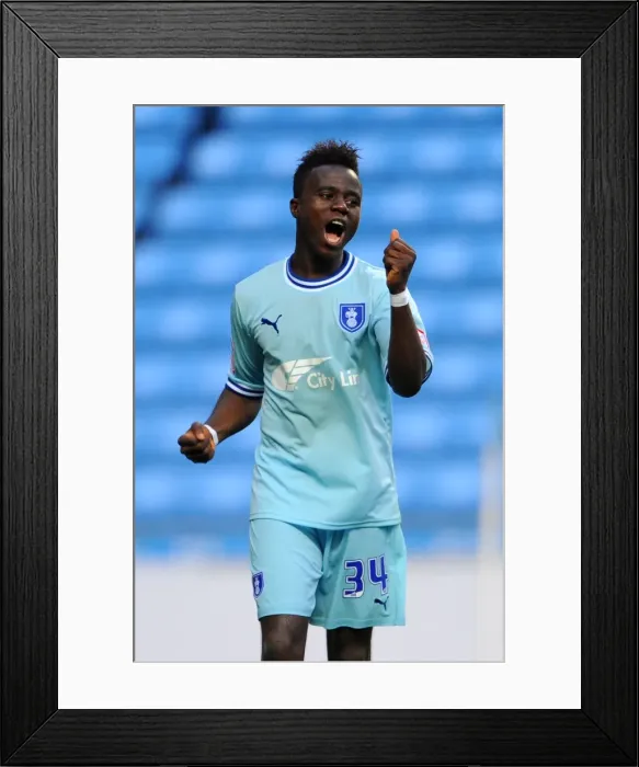 Framed Print : Gael Bigirimana's Championship Title Triumph: Coventry City FC's Glorious Moment Against Derby County (10-09-2011) Framed Print : Gael Bigirimana's Championship Title Triumph: Coventry City FC's Glorious Moment Against Derby County (10-09-2011)