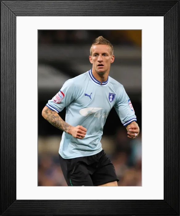 Framed Print : Coventry City vs Derby County: Carl Baker's Epic Showdown in Championship Clash (Sept 2011)