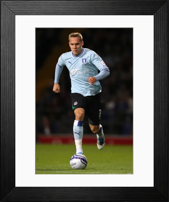 Framed Print : Chris Hussey's Intense Showdown: Coventry City vs Derby County at Portman Road (19-09-2011)