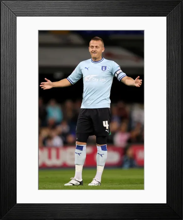 Framed Print : Coventry City vs Derby County: Sammy Clingan in Action - Npower Championship, Ricoh Arena (19-09-2011) Framed Print : Coventry City vs Derby County: Sammy Clingan in Action - Npower Championship, Ricoh Arena (19-09-2011)