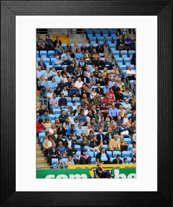 Framed Print : Npower Championship Showdown: Coventry City vs Reading - Intense Focus of Coventry Fans at Ricoh Arena (September 24, 2011) Framed Print : Npower Championship Showdown: Coventry City vs Reading - Intense Focus of Coventry Fans at Ricoh Arena (September 24, 2011)