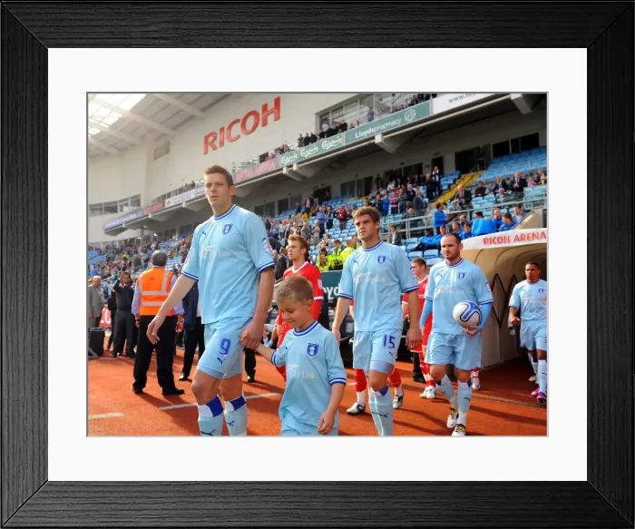 Framed Print : Coventry City FC: Lukas Jutkiewicz and Matchday Mascot Kick-Off at Ricoh Arena vs. Reading (Npower Championship, 24-09-2011) Framed Print : Coventry City FC: Lukas Jutkiewicz and Matchday Mascot Kick-Off at Ricoh Arena vs. Reading (Npower Championship, 24-09-2011)