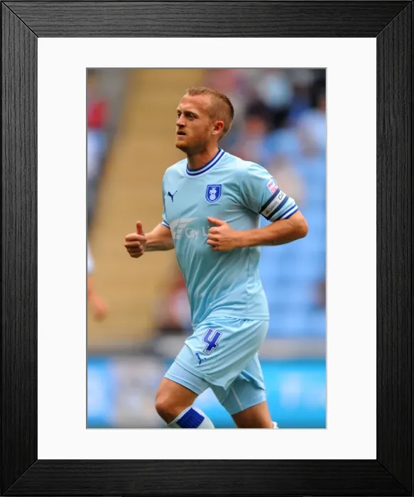 Framed Print : Sammy Clingan in Action for Coventry City Against Reading at Ricoh Arena (September 24, 2011) Framed Print : Sammy Clingan in Action for Coventry City Against Reading at Ricoh Arena (September 24, 2011)