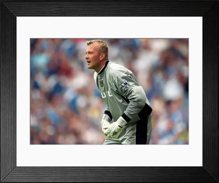 Framed Print : Manchester City vs Coventry City: Magnus Hedman's Determined Stand at the Coventry Goalpost (Premier League, 26-08-2000) Framed Print : Manchester City vs Coventry City: Magnus Hedman's Determined Stand at the Coventry Goalpost (Premier League, 26-08-2000)