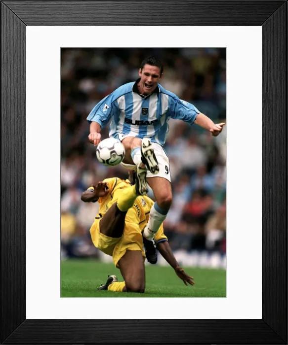 Framed Print : Cedric Roussel vs. Lucas Radebe: A Battle in the FA Carling Premiership - Coventry City vs. Leeds United (September 9, 2000) Framed Print : Cedric Roussel vs. Lucas Radebe: A Battle in the FA Carling Premiership - Coventry City vs. Leeds United (September 9, 2000)