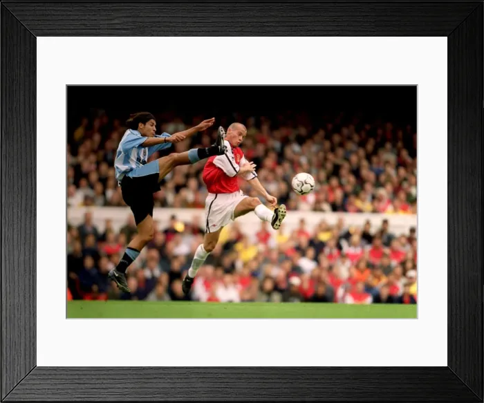 Framed Print : Clash of Stars: Ljungberg vs. Chippo - Arsenal vs. Coventry City, FA Carling Premiership (16-09-2000) Framed Print : Clash of Stars: Ljungberg vs. Chippo - Arsenal vs. Coventry City, FA Carling Premiership (16-09-2000)
